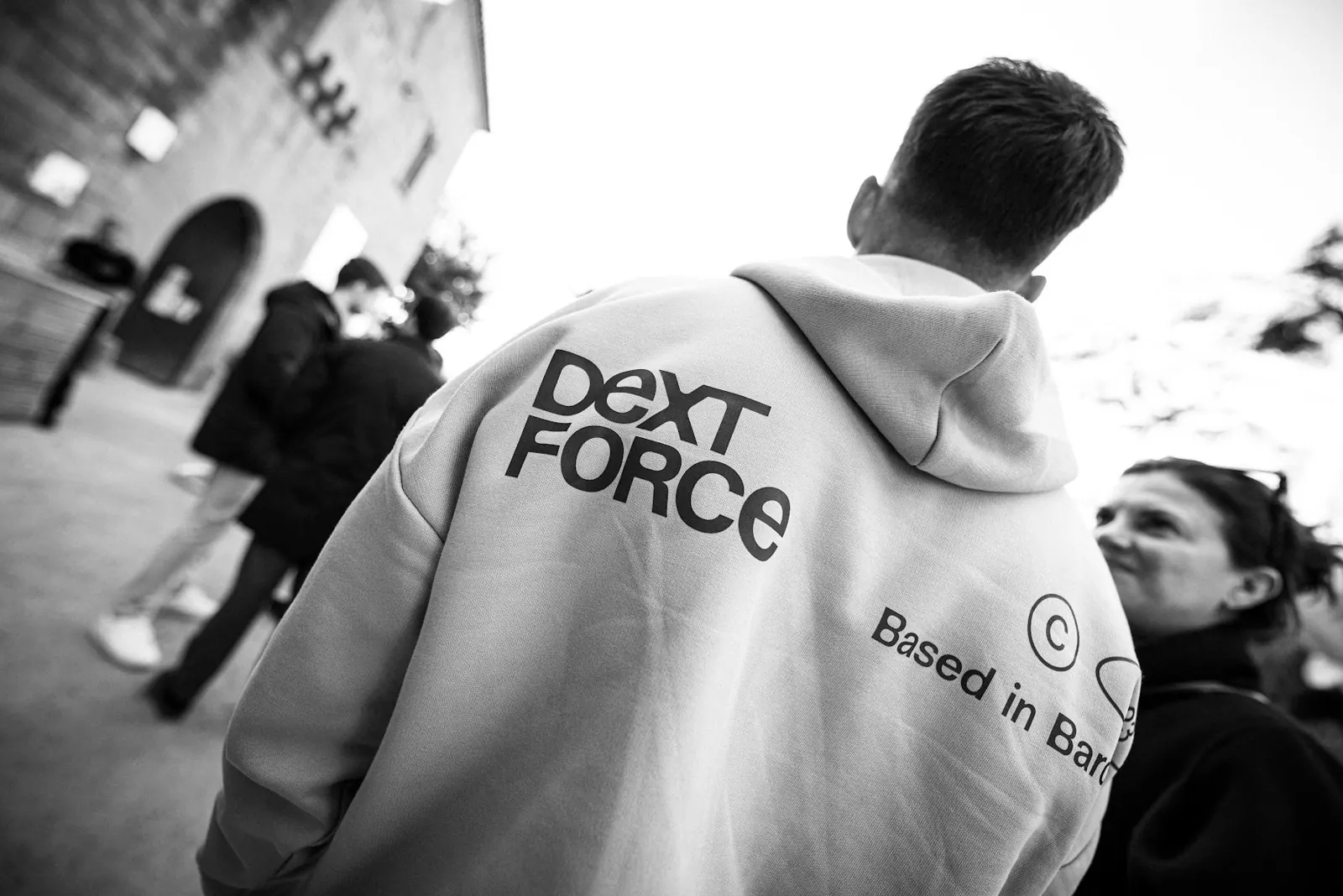 Attendee wearing a DEXT FORCE hoodie at the venue